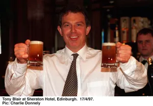 Tony Blair holding two half pints of Blair's Brew beer in both hands. April 1997 Tony Blair holding two half pints of Blair's Brew beer in both hands. April 1997