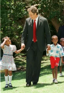 Tony Blair South Africa Visit January 1999 with the Aids child he sponsors at Tony Blair South Africa Visit January 1999 with the Aids child he sponsors at