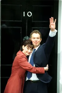 Tony Blair and wife Cherie stand at the door of 10 Downing Street waving to the crowd Tony Blair and wife Cherie stand at the door of 10 Downing Street waving to the crowd