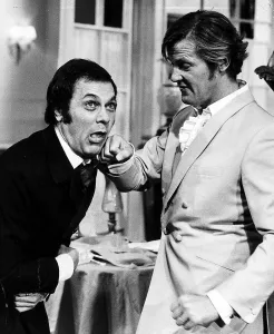 Tony Curtis and Roger Moore ham it up on the set of the Television series THE PERSUADERS Tony Curtis and Roger Moore ham it up on the set of the Television series THE PERSUADERS