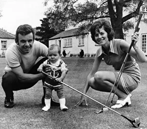 Images Dated 29th May 1971: Tony Jacklin Golfer Shows young son Bradley the grip that won the US Open watched by his