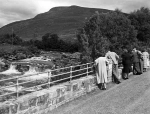 Torrandhu Bridge with the falls of glascarnoch river in Ross and Cromarty Torrandhu Bridge with the falls of glascarnoch river in Ross and Cromarty