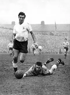 Tottenham Hotspur striker Bobby Smith in action against Sheffield Wednesday Tottenham Hotspur striker Bobby Smith in action against Sheffield Wednesday