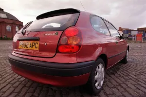 Toyota Corolla Pictured from back November 1997 Red car Toyota Corolla Pictured from back November 1997 Red car