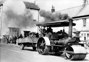 This traction engine steam roller is taking people for a ride in a trailer on 19th May This traction engine steam roller is taking people for a ride in a trailer on 19th May