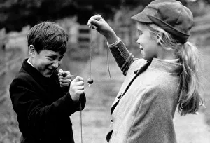 Traditional Games Conkers Lisa Allpress takes on Nicholas Dutt in a game of Traditional Games Conkers Lisa Allpress takes on Nicholas Dutt in a game of