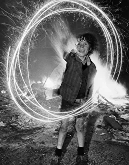 The traditional sparkler still holds plenty of magic for eight year old Terry Gibaney of The traditional sparkler still holds plenty of magic for eight year old Terry Gibaney of