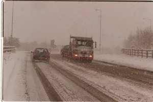 Traffic driving along a snow covered road in kent after Britain was hit by the Big Freeze Traffic driving along a snow covered road in kent after Britain was hit by the Big Freeze