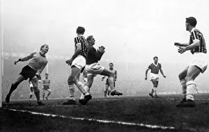 Trautmann is well supported by Manchester City defenders as he catches a shot from Vernon Trautmann is well supported by Manchester City defenders as he catches a shot from Vernon
