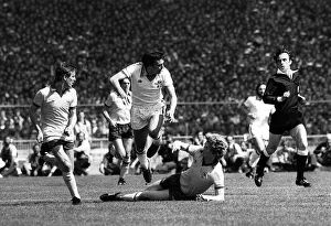 Trevor Brooking is brought down by Arsenals Willie Young during the FA Cup final at Trevor Brooking is brought down by Arsenals Willie Young during the FA Cup final at