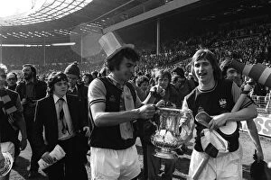 Trevor Brooking and Kevin Locke with the FA Cup 1975 after West Ham had beaten