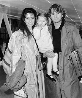 Images Dated 5th September 1987: Trevor Eve Actor with wife Sharon and Daughter Alice leaving Heathrow September