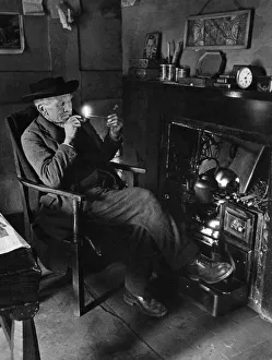 Trinity Hospital foundation. Mr. H South lights his pipe in preparation for a Trinity Hospital foundation. Mr. H South lights his pipe in preparation for a
