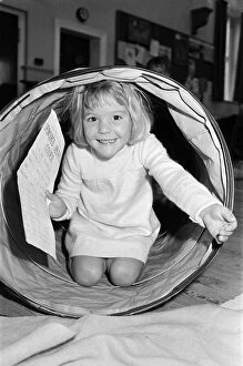 Images Dated 13th October 1986: Tunnelling for sponsorship cash is four-year old Helen Copley who took part in an