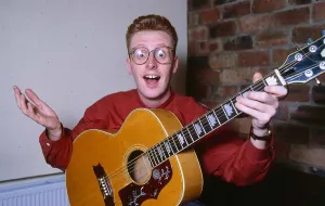 Images Dated 1st July 1990: TV presenter Bryan Burnett playing guitar 1990
