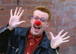 Images Dated 1st July 1990: TV presenter Bryan Burnett wearing a red nose 1990