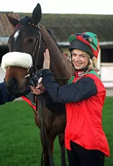 Images Dated 4th April 1997: Tv Presenter Zoe Ball dressed in Mirror racing colours with Avro Anson - the horse