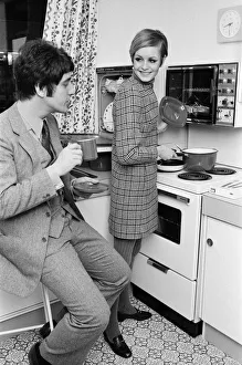 01159 Gallery: Twiggy with her manager, Justin de Villeneuve in one of the stands at the Ideal Home