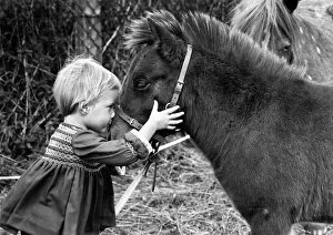 Images Dated 17th October 2014: Two-year-old Serena Marler face to face with her pet Shetland pony, Delhi
