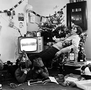 Images Dated 20th December 1970: A typical family scene around the television on Christmas day