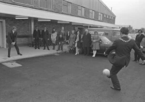 Images Dated 10th December 1972: An unusual spot for a little spontaneous soccer - the forecourt of Hewin'