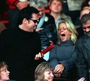 Images Dated 2nd November 1996: Vic Reeves and Ulrika Jonsson TV Presenter sitting in the stands at Old Trafford to watch