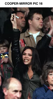 Images Dated 15th March 1997: Victoria Adams member of pop group the Spice Girls suddenly likes football as she visits