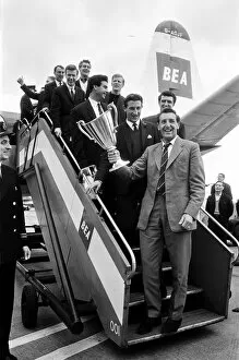 Core93 Gallery: The victorious Tottenham Hotspur team holding European Cup Winners Cup Winners trophy as