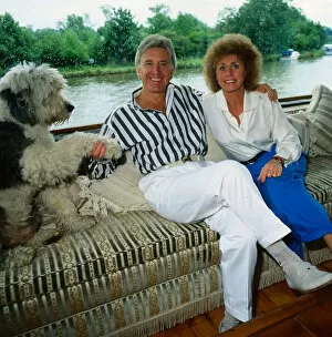 Images Dated 31st July 1988: Vince Hill singer July 1988 Sitting wearing striped shirt with wife Anne and dog