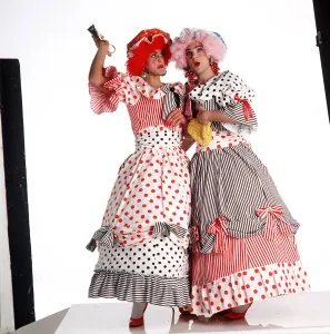 Vinny Jones and Neil Ruddock in drag for panto season as the ugly sisters msi A©Mirrorpix Vinny Jones and Neil Ruddock in drag for panto season as the ugly sisters msi A©Mirrorpix