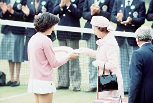 Virginia Wade receives the Wimbledon womens trophy 1977 from the Queen Virginia Wade receives the Wimbledon womens trophy 1977 from the Queen