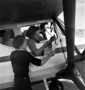 W. J. A. C. girls seen here planning a route to her destination . August 1952 C4029 W. J. A. C. girls seen here planning a route to her destination . August 1952 C4029