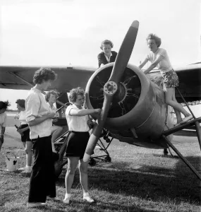 W. J. A. C. girls seen here servicing plane. August 1952 C4029 W. J. A. C. girls seen here servicing plane. August 1952 C4029