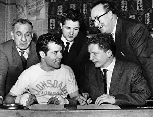Walter McGowan and Jackie Brown sign for a fight Walter McGowan and Jackie Brown sign for a fight