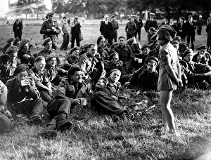 War: Invasion of France June 1944 10 years old Edna McCundle entertains the troops War: Invasion of France June 1944 10 years old Edna McCundle entertains the troops
