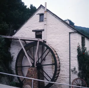 A water wheel on a house in Polperro, Cornwall. 1973 A water wheel on a house in Polperro, Cornwall. 1973