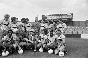 Images Dated 29th August 1982: Watford FC chairman Elton John with Watford football team at a photocall