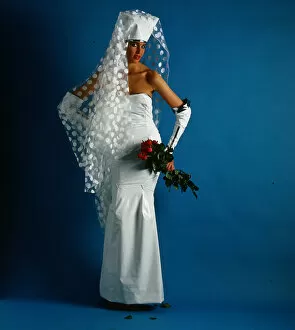Wedding dress and fashion, June 1986 Model wearing PVC strapless dress