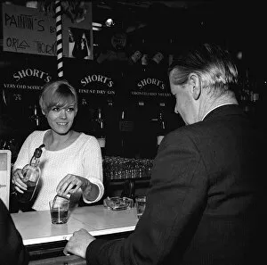 00150 Gallery: Wendy Richard Actress Model aged 19 years old May 1966 serving behind a bar near