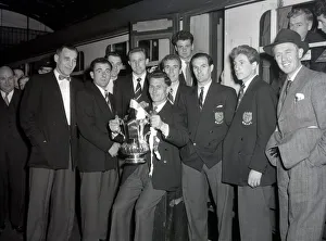 West Bromwich Albion Players with the FA Cup trophy prior to boarding the train as they West Bromwich Albion Players with the FA Cup trophy prior to boarding the train as they
