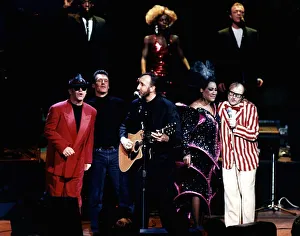 The Who pop group with various singers Elton John singer left in red suit The Who pop group with various singers Elton John singer left in red suit