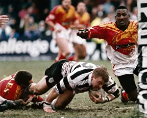 Images Dated 14th February 1994: Widnes v Sheffield Eagles, Rugby League match. Paul Hume dragged downright on the line by