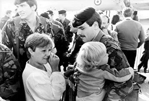 WIFE OF BRITISH SERVICEMAN WIPES AWAY THE TEARS DURING FAMILY REUNION BACK FROM THE WIFE OF BRITISH SERVICEMAN WIPES AWAY THE TEARS DURING FAMILY REUNION BACK FROM THE