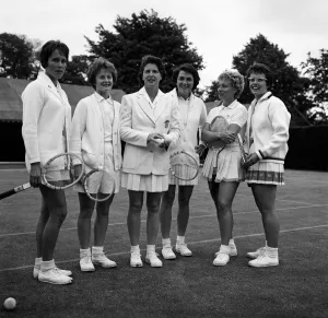 01239 Gallery: The Wightman Cup Tennis girls commence a stiff training session at Wimbledon today