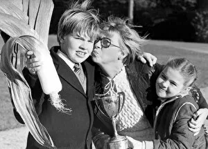 Images Dated 1st September 1983: William Marley is a prize leek grower at 12 year ols and gets a kiss from his mum, Mary