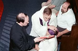 William Ramsey from Southend-on-Sea in the UK being exorcised by Bishop Robert McKenna at