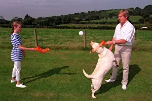 William Roache Actor playing with his daughter and their dog in the back garden William Roache Actor playing with his daughter and their dog in the back garden