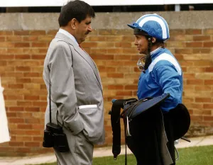 Willie Carson horseracing Jockey talking to owner Hamdan Al Maktoum Willie Carson horseracing Jockey talking to owner Hamdan Al Maktoum