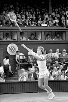00071 Gallery: Wimbledon 1981. John McEnroe throws his racket in the air. July 1981 81-3764-058