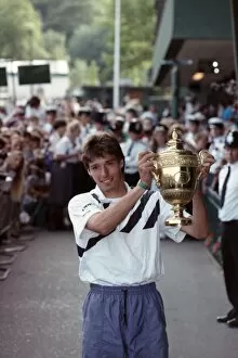 Images Dated 7th July 1991: Wimbledon. Champion Michael Stich with Trophy and Family. July 1991 91-4302-304